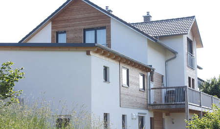 Dům s komínem ABSOLUT.