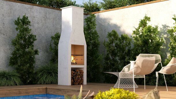 Der GARDEN FIREPLACE 500 an einer Backsteinmauer