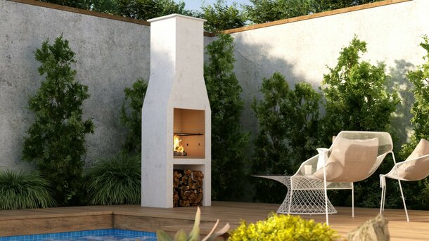 Der GARDEN FIREPLACE 500 an einer Backsteinmauer
